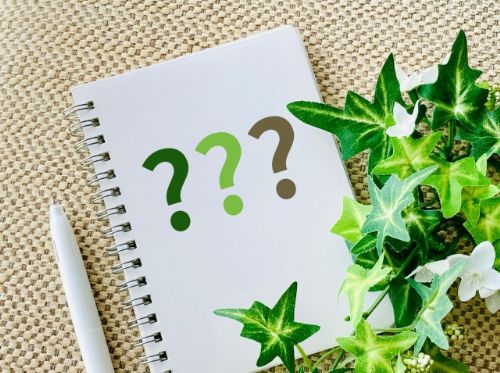 ？が書かれたノート